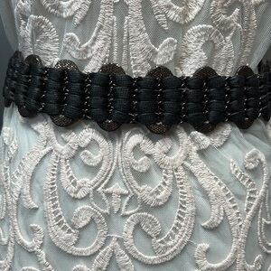 Chicos belt adjustable copper sequin ovals linked by weaving ovals with chain.